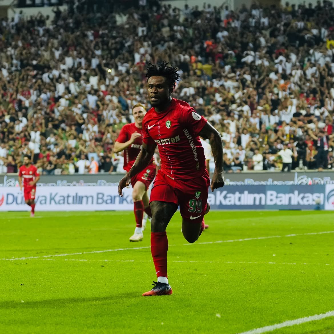 Gift Orban celebrating in front of a full stand