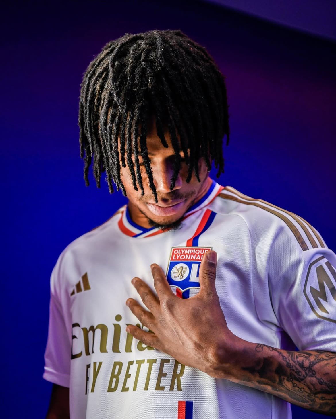 Gift Orban with his hand on the club badge